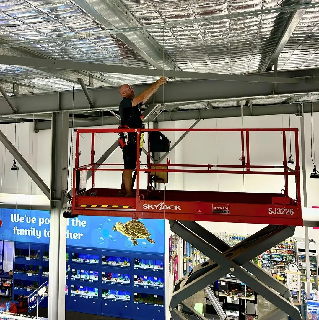 Commercial electrical work — All Things Power on scissor lift